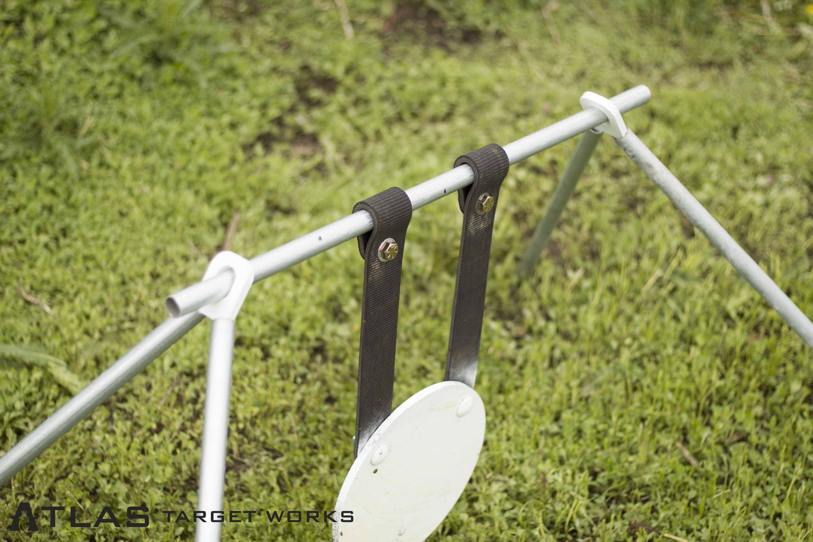 rubber steel target gong hanging straps wrapped around conduit