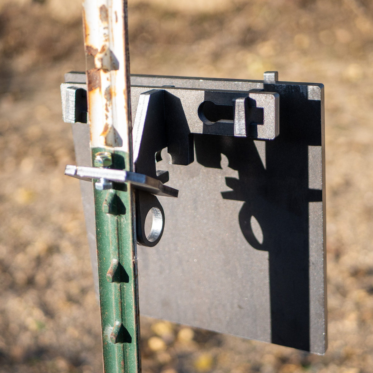 Double hole square gong on a double hook t-post mount rear view
